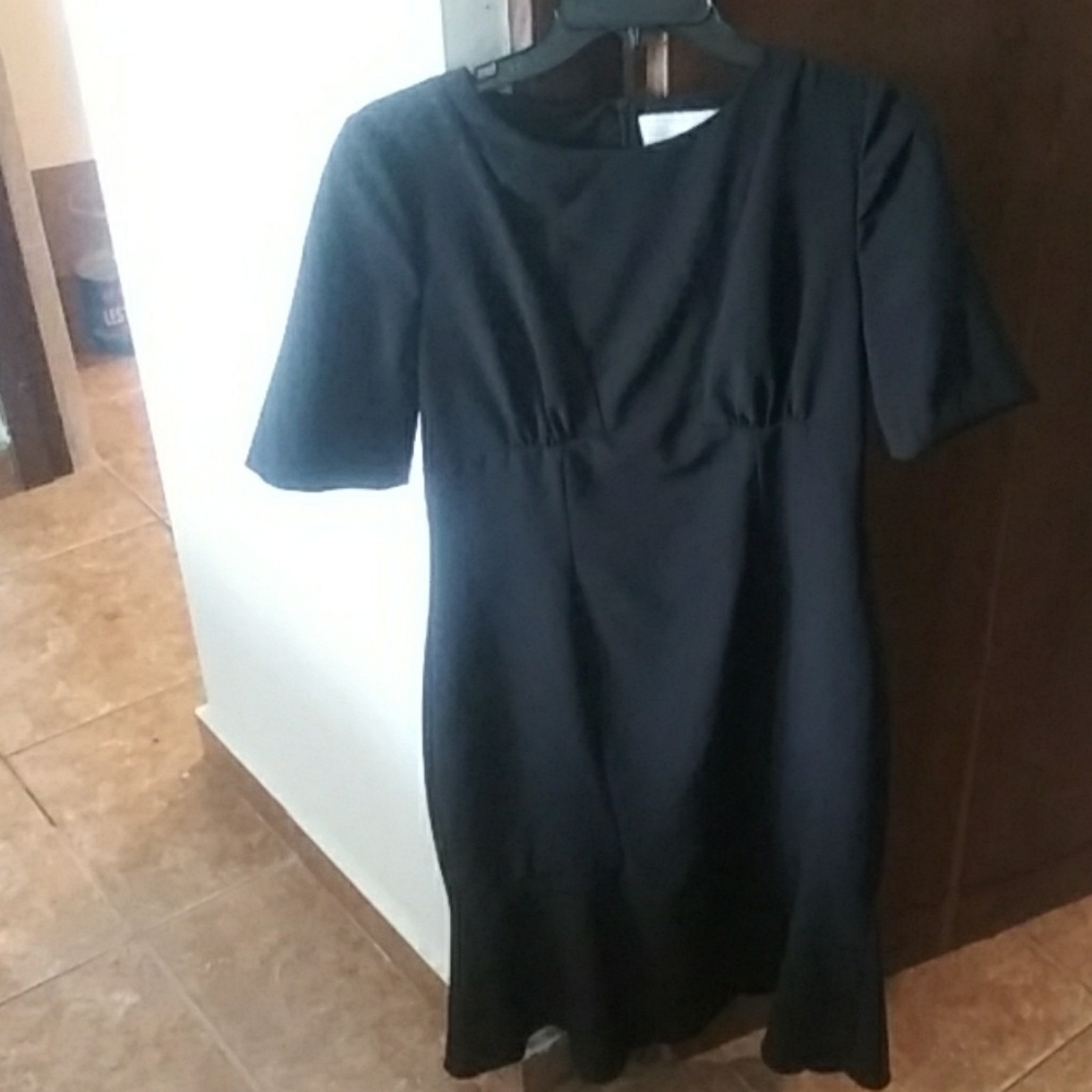 Black. light mermaid/flute style dress